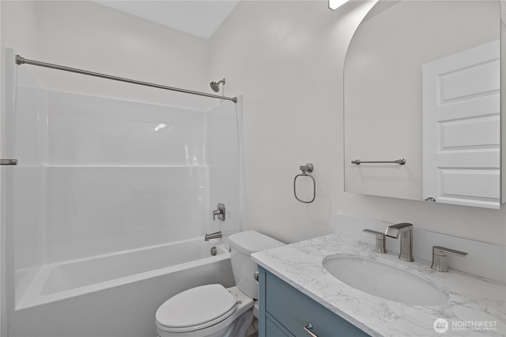 608 4th Street Mattawa, WA 99349 - Photo 18 of 40 a bathroom with a granite countertop bathtub shower sink vanity and toilet