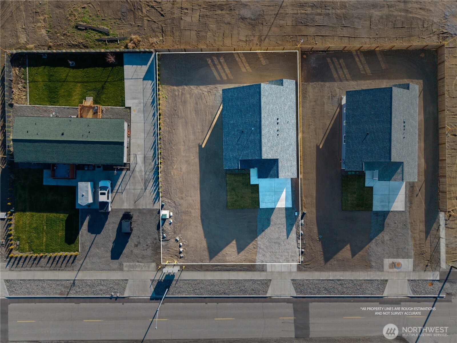 608 4th Street Mattawa, WA 99349 - Photo 36 of 40 an aerial view of a house with a garden and plants