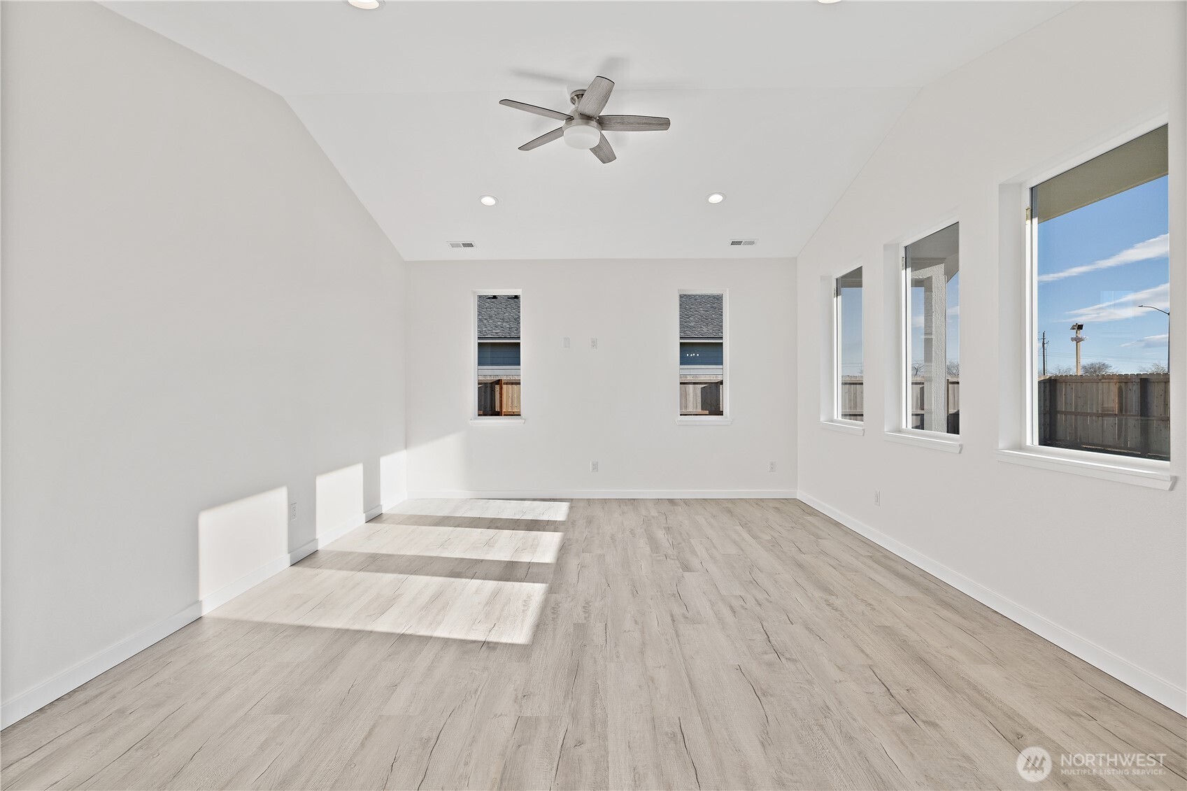 608 4th Street Mattawa, WA 99349 - Photo 5 of 40 wooden floor in an empty room with a window
