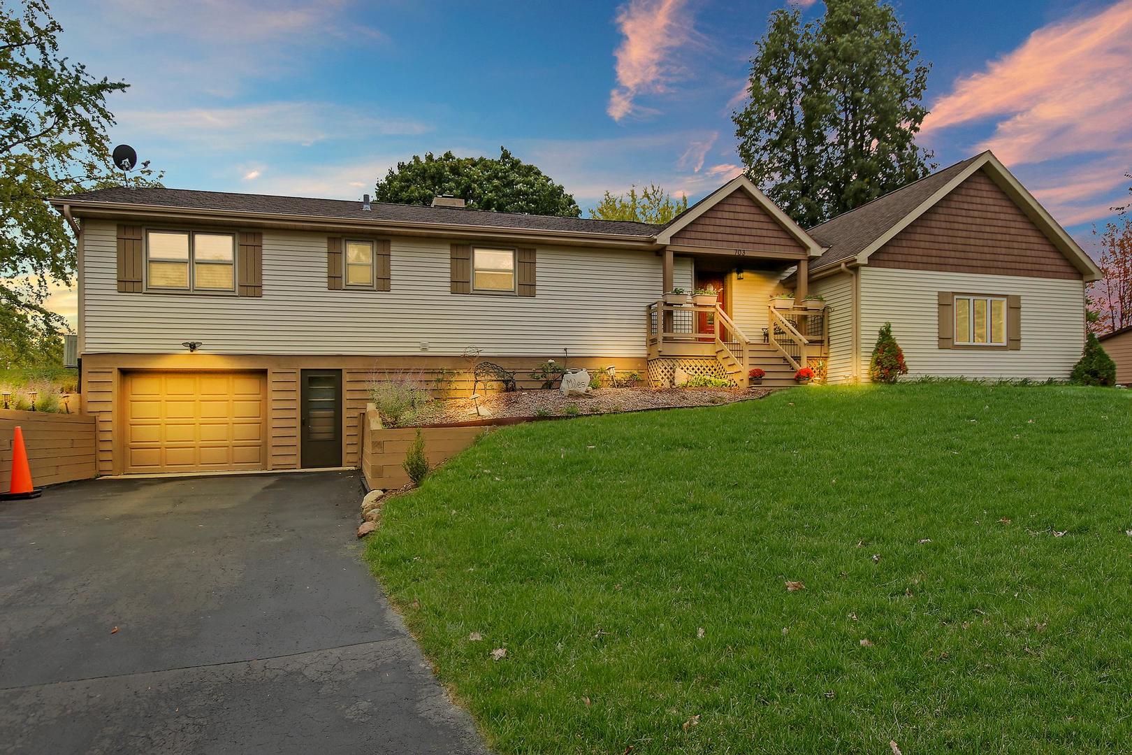 703 Crestview Drive Ingleside, IL 60041 - Photo 1 of 28 a front view of house with yard and green space