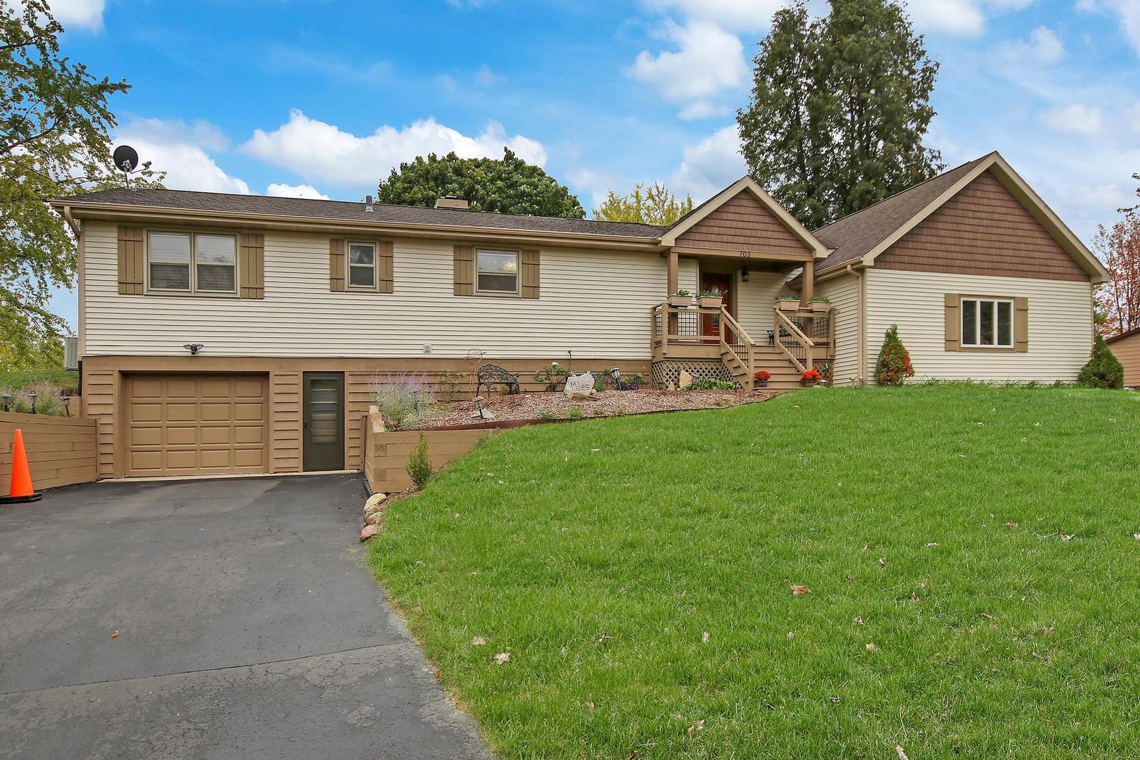 703 Crestview Drive Ingleside, IL 60041 - Photo 2 of 28 a front view of house with yard and green space