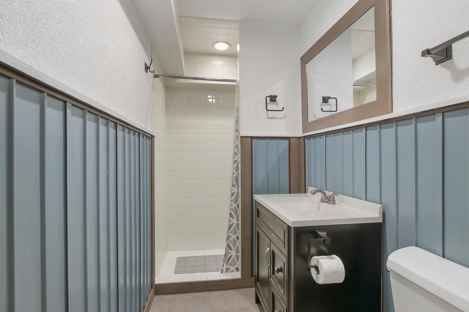 703 Crestview Drive Ingleside, IL 60041 - Photo 22 of 28 a bathroom with a sink and mirror