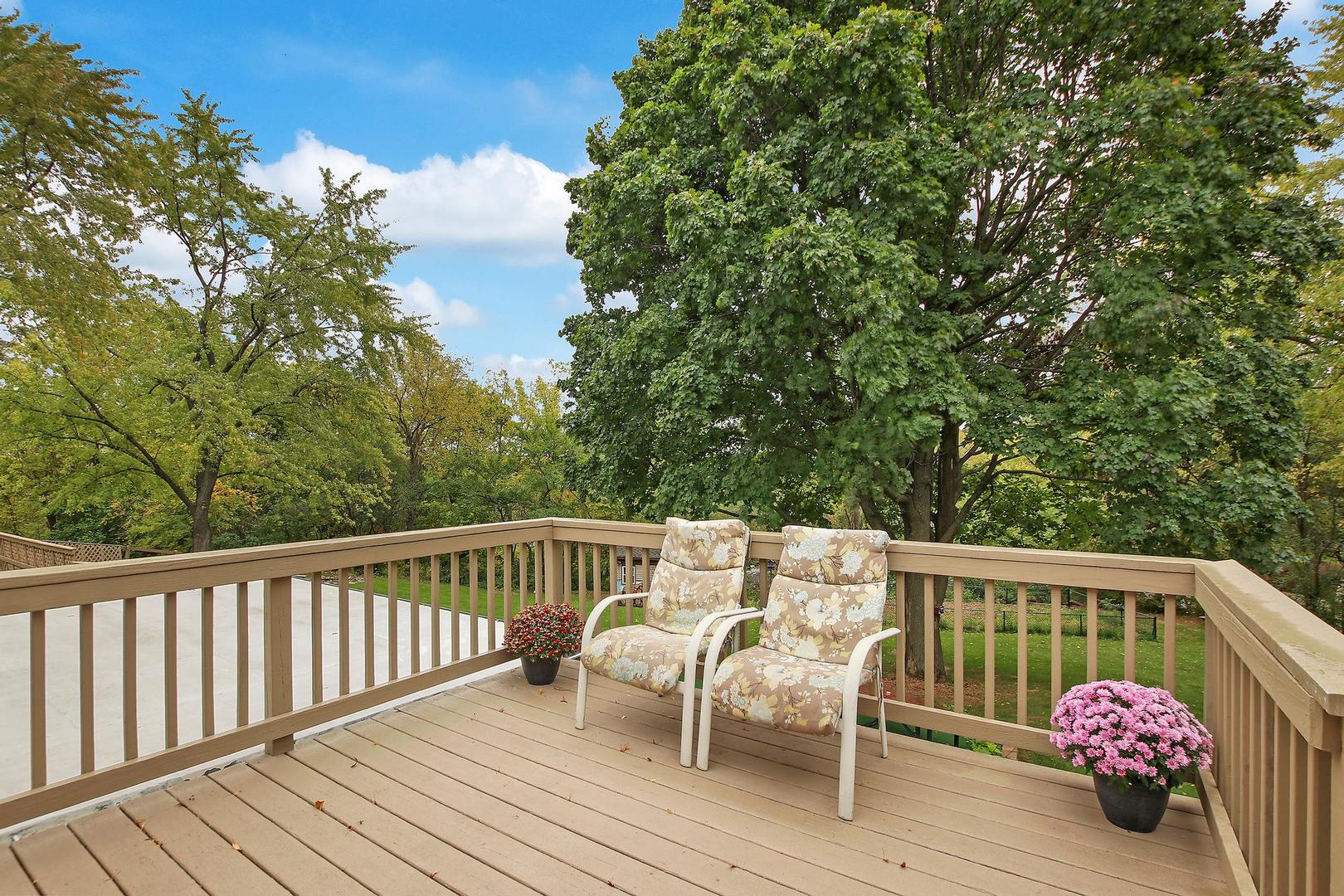 703 Crestview Drive Ingleside, IL 60041 - Photo 25 of 28 a view of a wooden bench on the roof deck