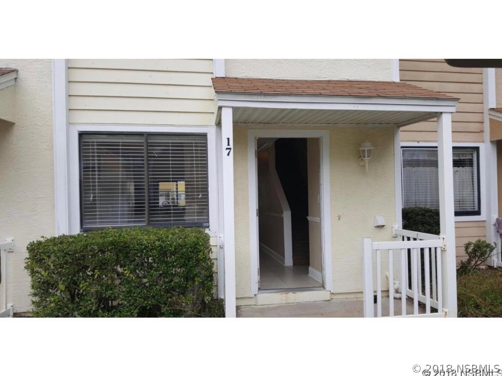 480 Reed Canal Road, Unit 17 South Daytona, FL 32119 - Photo 1 of 1 a black and white photo of a house