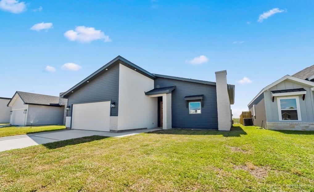 2310 Treasure Cove Harlingen, TX 78550 - Photo 1 of 23 a house view with a outdoor space