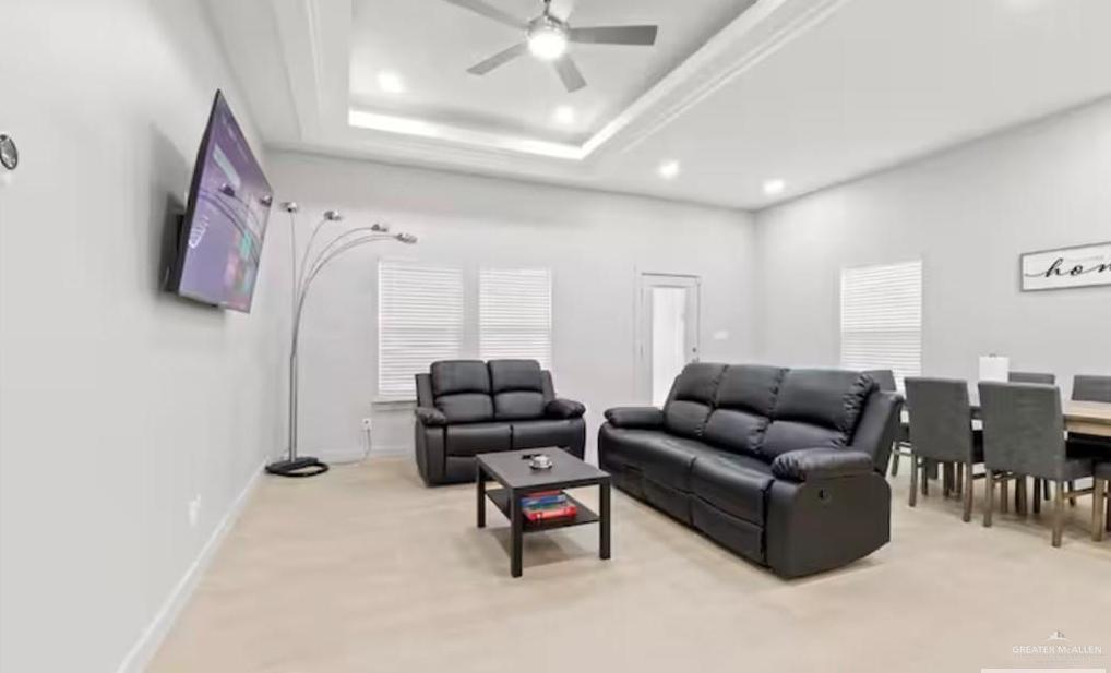 2310 Treasure Cove Harlingen, TX 78550 - Photo 15 of 23 a living room with furniture and a flat screen tv
