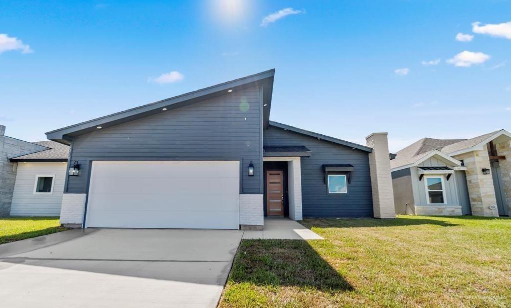 2310 Treasure Cove Harlingen, TX 78550 - Photo 2 of 23 a view of a house with a swimming pool