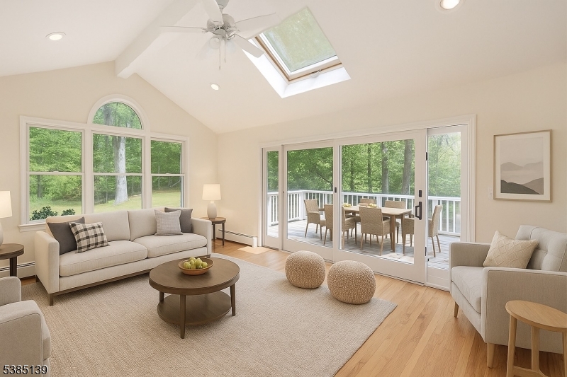 59 Ferguson Road Warren, NJ 07059 - Photo 11 of 26 a living room with furniture and a large window