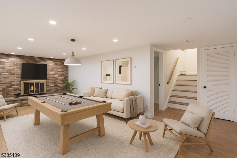 59 Ferguson Road Warren, NJ 07059 - Photo 14 of 26 a room with furniture and a flat screen tv