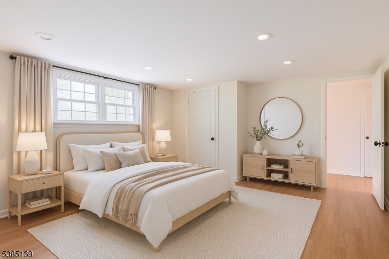 59 Ferguson Road Warren, NJ 07059 - Photo 16 of 26 a bedroom with bed and a chandelier