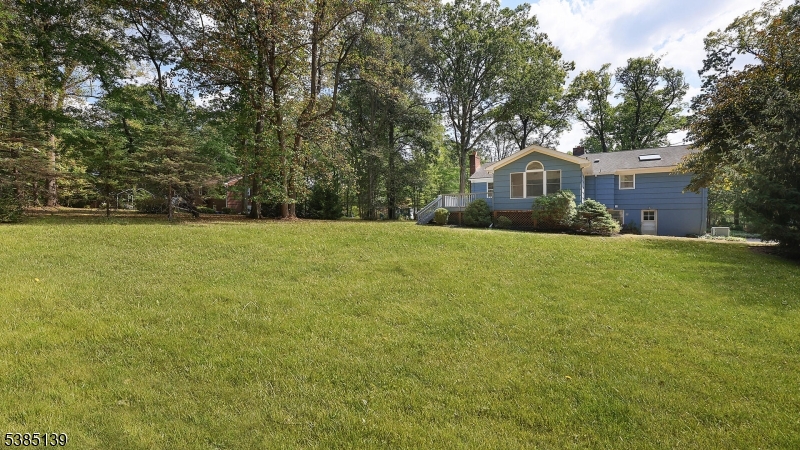 59 Ferguson Road Warren, NJ 07059 - Photo 22 of 26 a view of a house with a yard