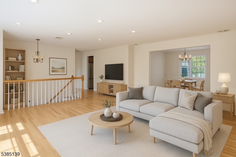 59 Ferguson Road Warren, NJ 07059 - Photo 4 of 26 a living room with furniture and a flat screen tv