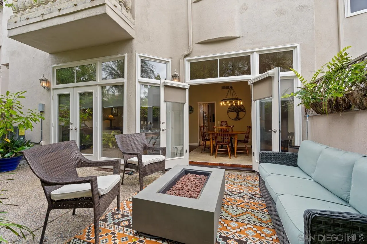 3128 Almahurst Row La Jolla, CA 92037 - Photo 11 of 21 a view of a patio with couches table and chairs and potted plants
