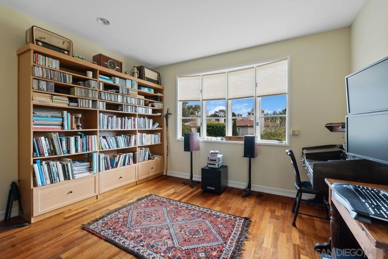3128 Almahurst Row La Jolla, CA 92037 - Photo 19 of 21 a view of a workspace with furniture and bathroom