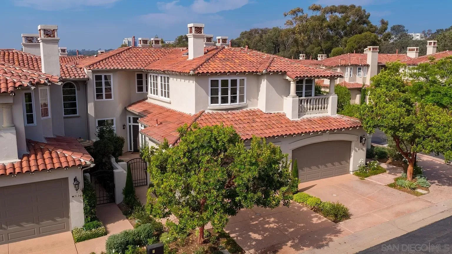 3128 Almahurst Row La Jolla, CA 92037 - Photo 21 of 21 a front view of a house with a garden