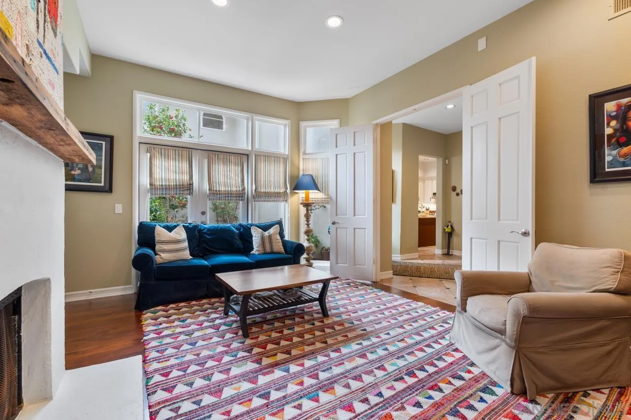 3128 Almahurst Row La Jolla, CA 92037 - Photo 7 of 21 a living room with furniture and a rug