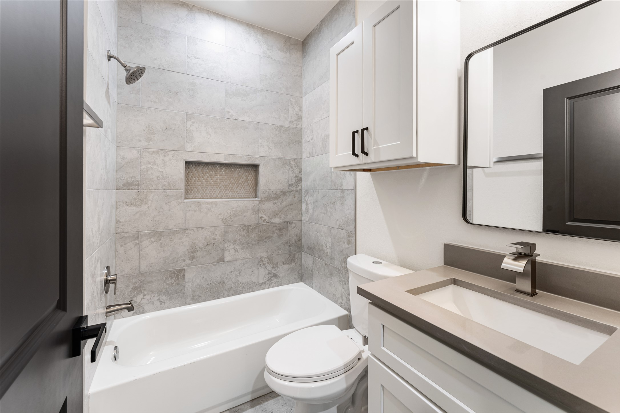 3620 Mt Pleasant Street, Unit A Houston, TX 77021 - Photo 16 of 23 a bathroom with a granite countertop sink toilet and shower