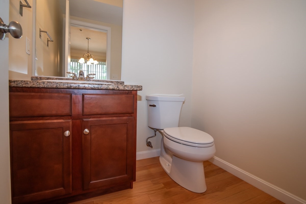 1975 Middlesex Street, Unit 51 Lowell, MA 01851 - Photo 11 of 34 a bathroom with a toilet and a sink