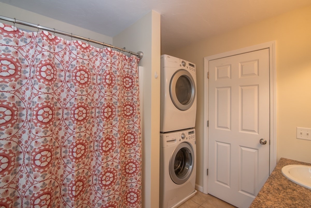 1975 Middlesex Street, Unit 51 Lowell, MA 01851 - Photo 18 of 34 a utility room with dryer and washer