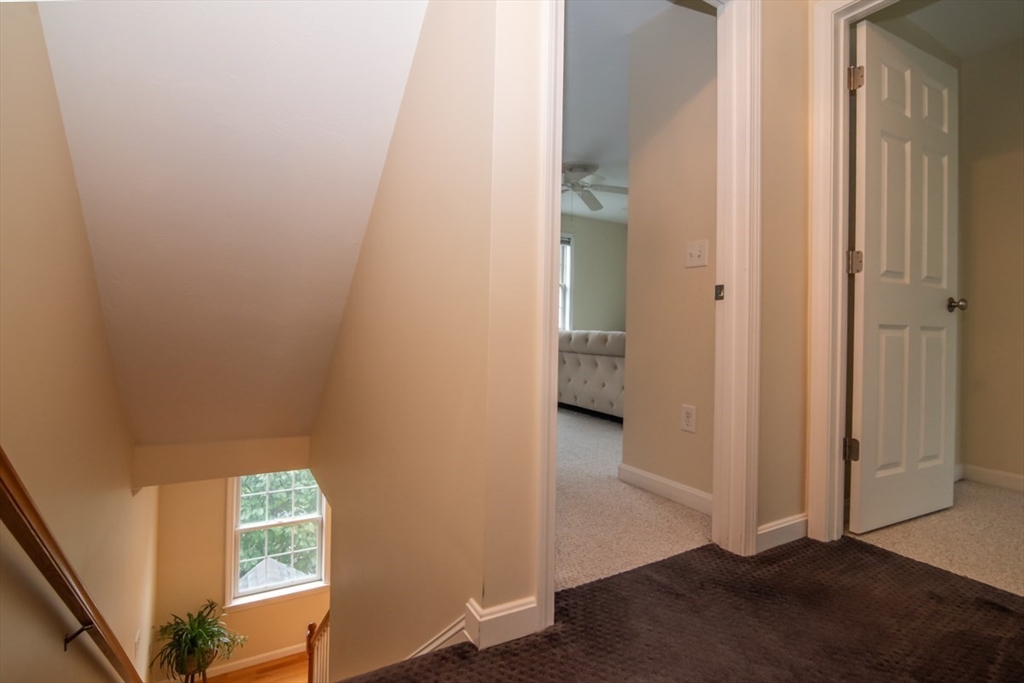 1975 Middlesex Street, Unit 51 Lowell, MA 01851 - Photo 27 of 34 wooden floor in a gallery