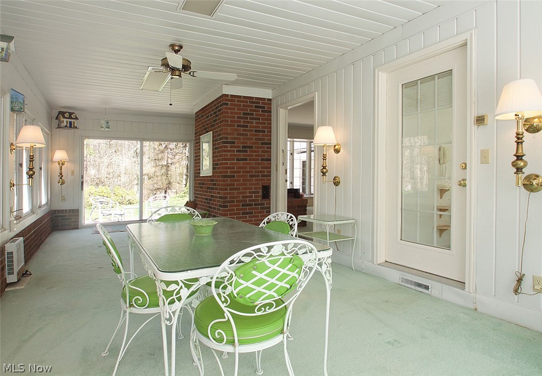 442 Riverview Road Gates Mills, OH 44040 - Photo 9 of 29 A year round sun room with sliding glass doors to several patios