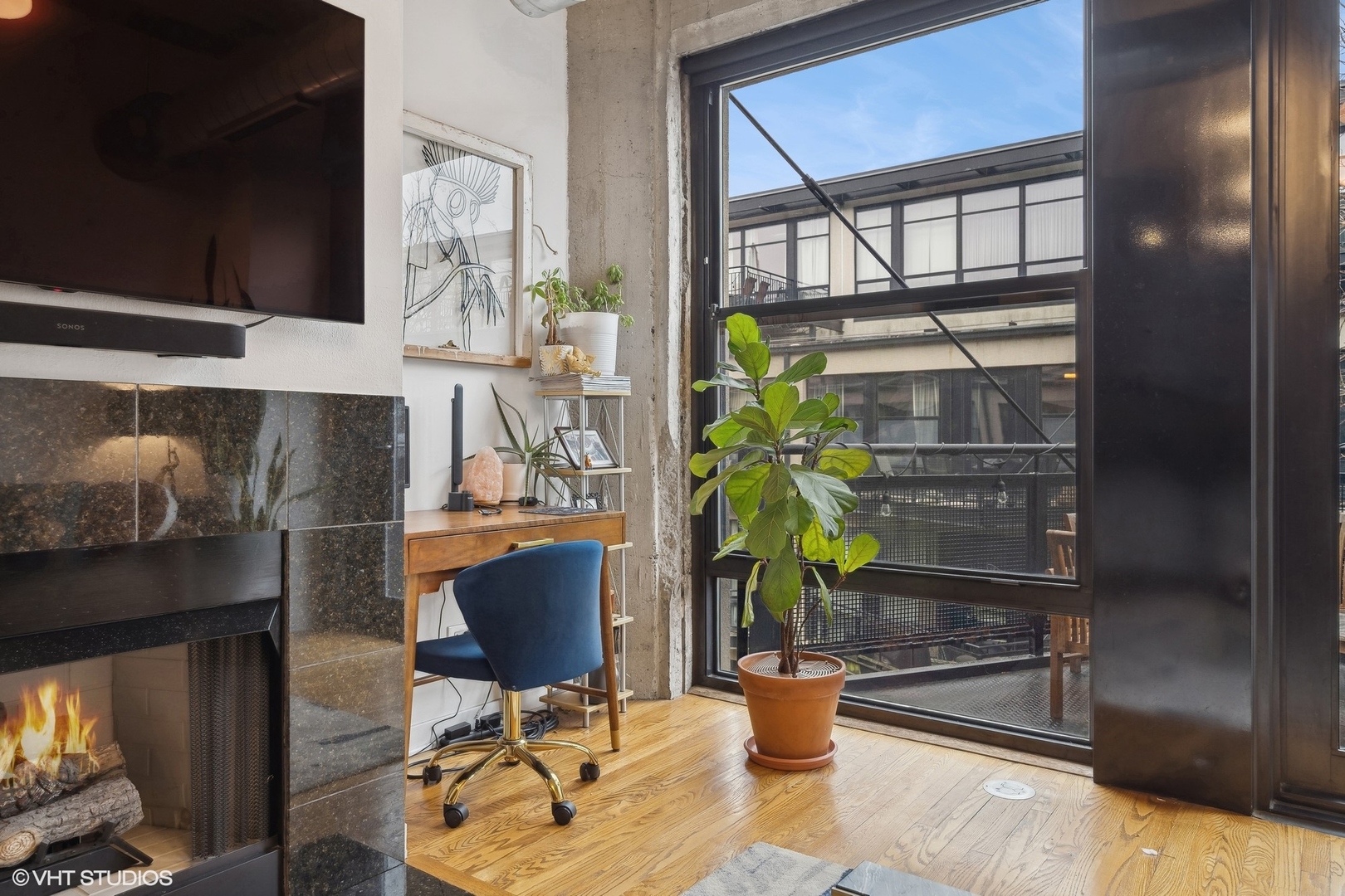 1069 West 14th Place, Unit 305 Chicago, IL 60608 - Photo 5 of 15 a dining room with furniture and a potted plant