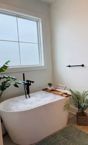 a room with a sink and a window