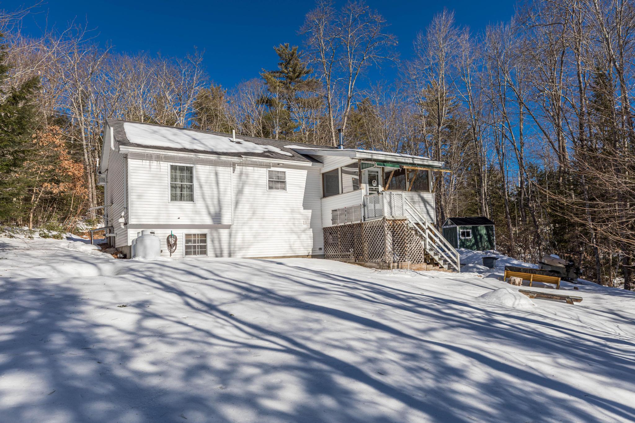 8 Hedgebog Mountain Road Naples, ME 04055 - Photo 31 of 33 rear yard in the snow