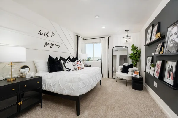 a bedroom with furniture and a couch