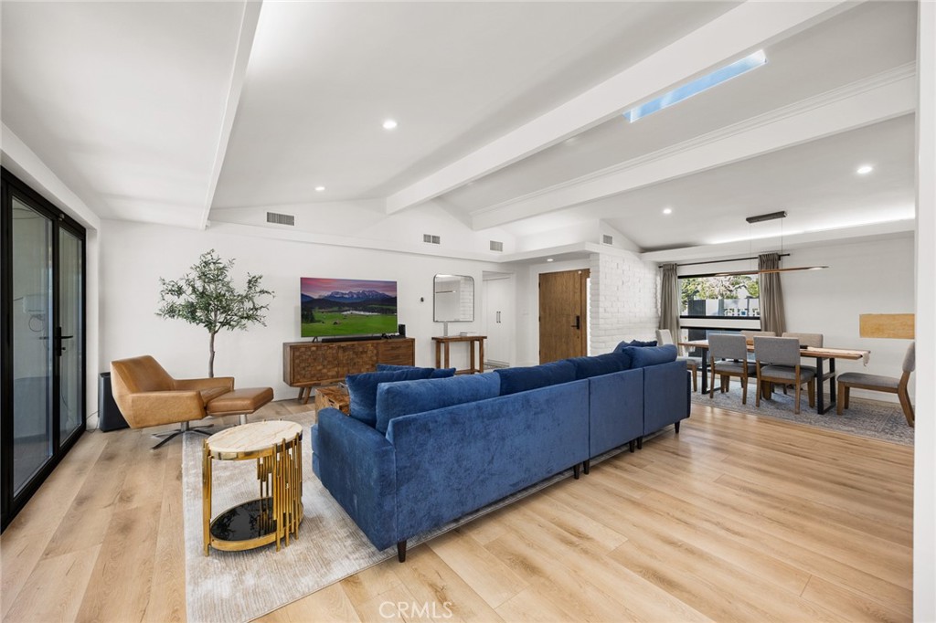 18234 Tribune Street Porter Ranch, CA 91326 - Photo 11 of 26 a living room with furniture and wooden floor