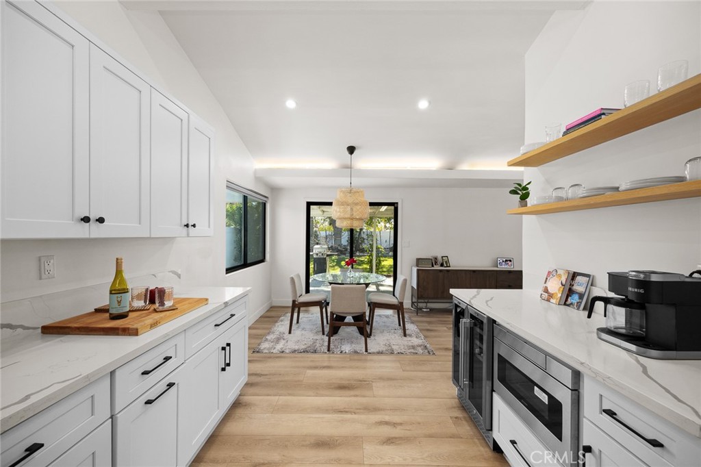 18234 Tribune Street Porter Ranch, CA 91326 - Photo 14 of 26 a kitchen with lots of counter top space
