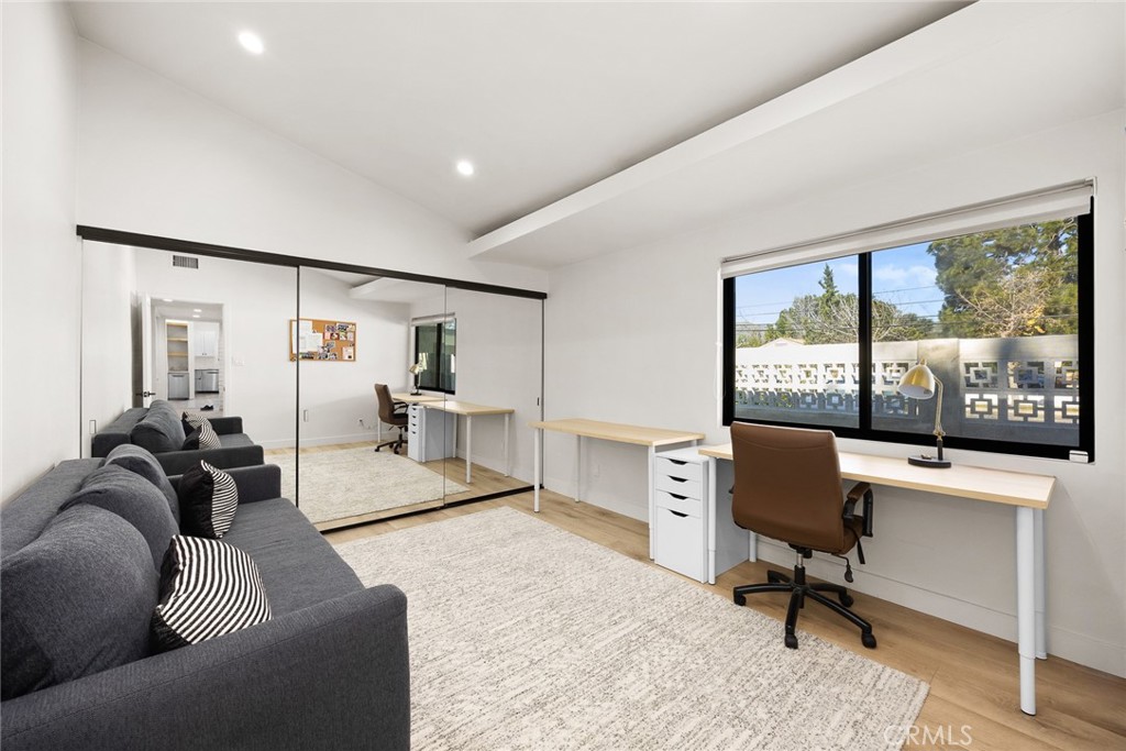 18234 Tribune Street Porter Ranch, CA 91326 - Photo 20 of 26 a living room with furniture and a large window