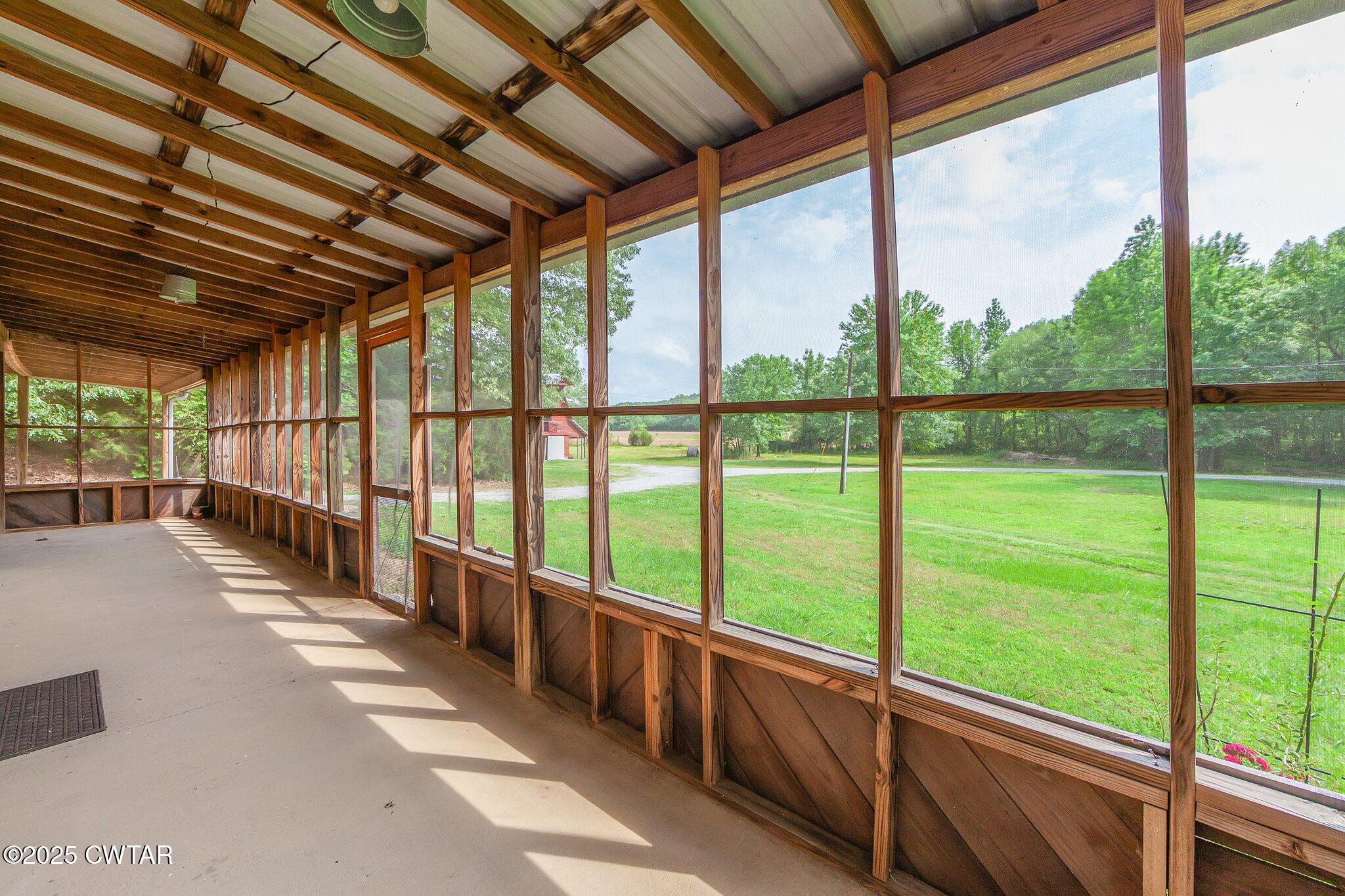 1276 Mifflin Road Jackson, TN 38301 - Photo 6 of 35 a view of an empty room with a large window