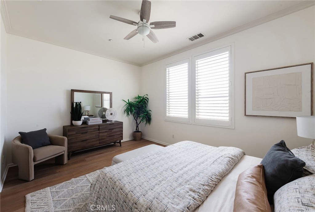 5341 Strand, Unit 105 Hawthorne, CA 90250 - Photo 21 of 67 a bedroom with a bed couches chair and a large window