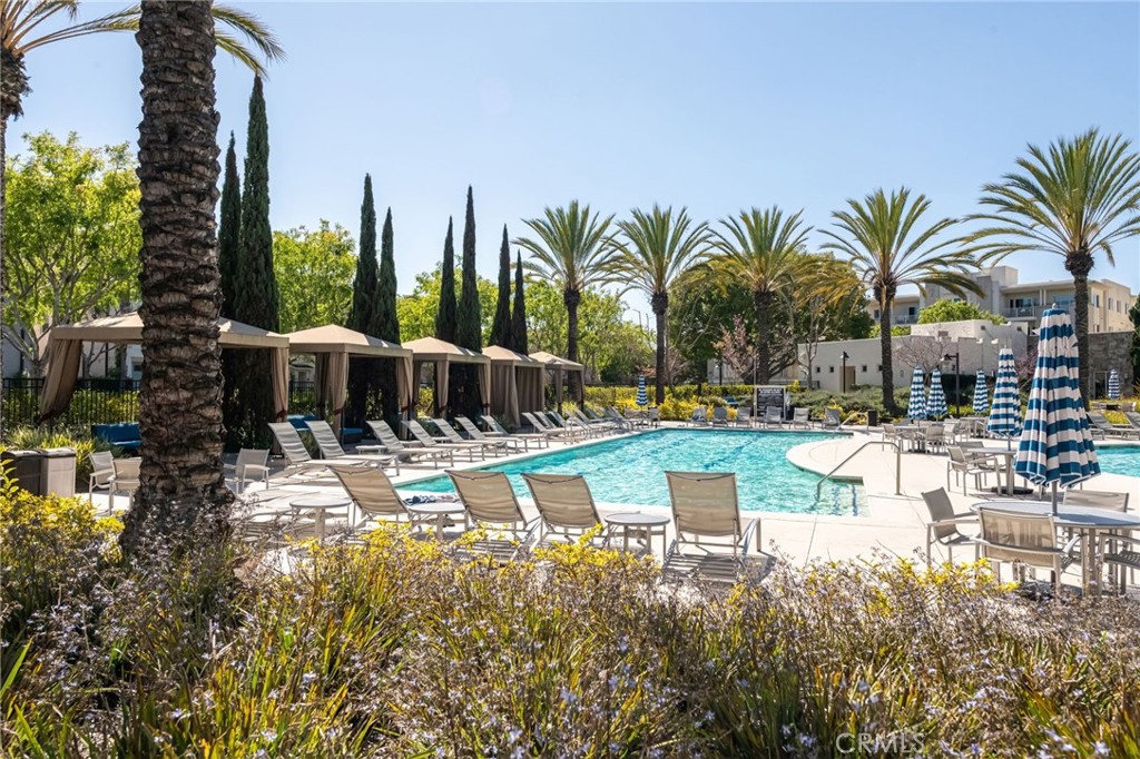 5341 Strand, Unit 105 Hawthorne, CA 90250 - Photo 32 of 67 a view of swimming pool with outdoor seating and plants