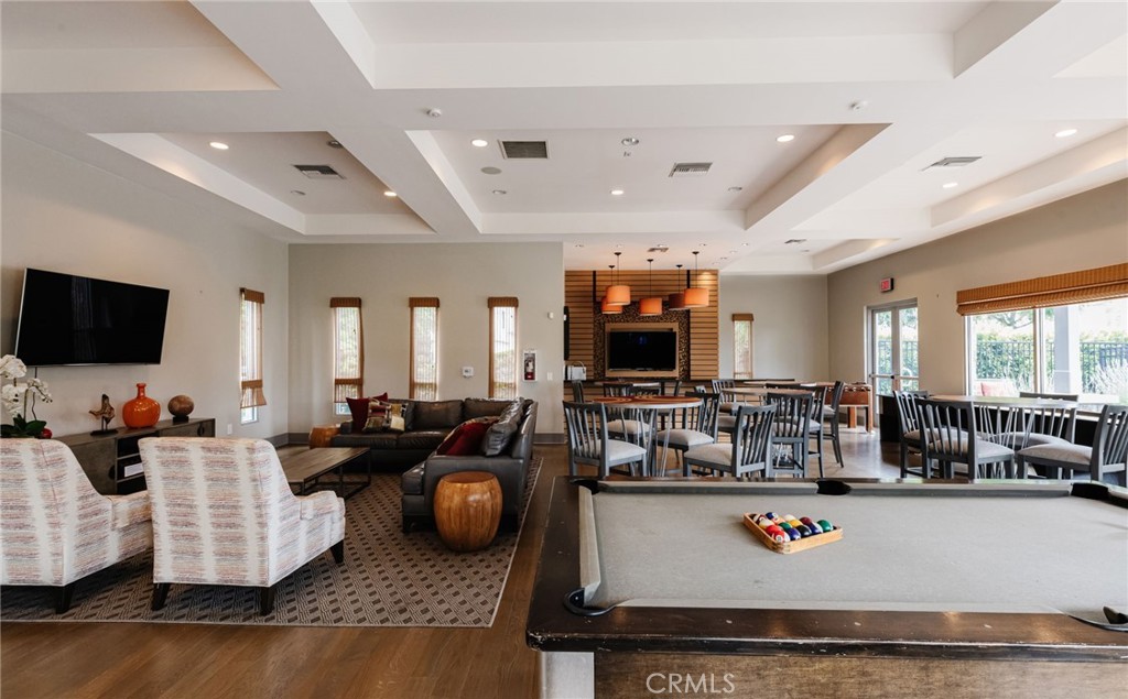 5341 Strand, Unit 105 Hawthorne, CA 90250 - Photo 43 of 67 a living room with furniture and a flat screen tv