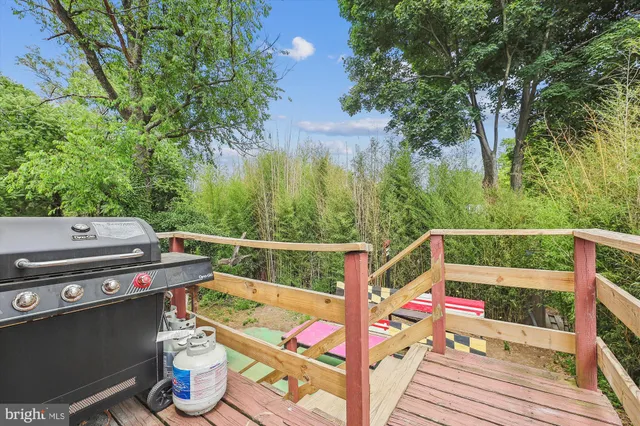 a view of an chairs and tables in the balcony