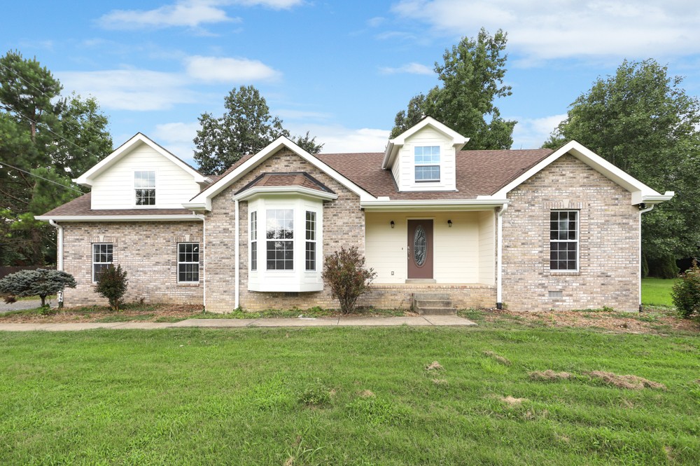 323 Independence Street Springfield, TN 37172 - Photo 1 of 37 a front view of a house with a yard