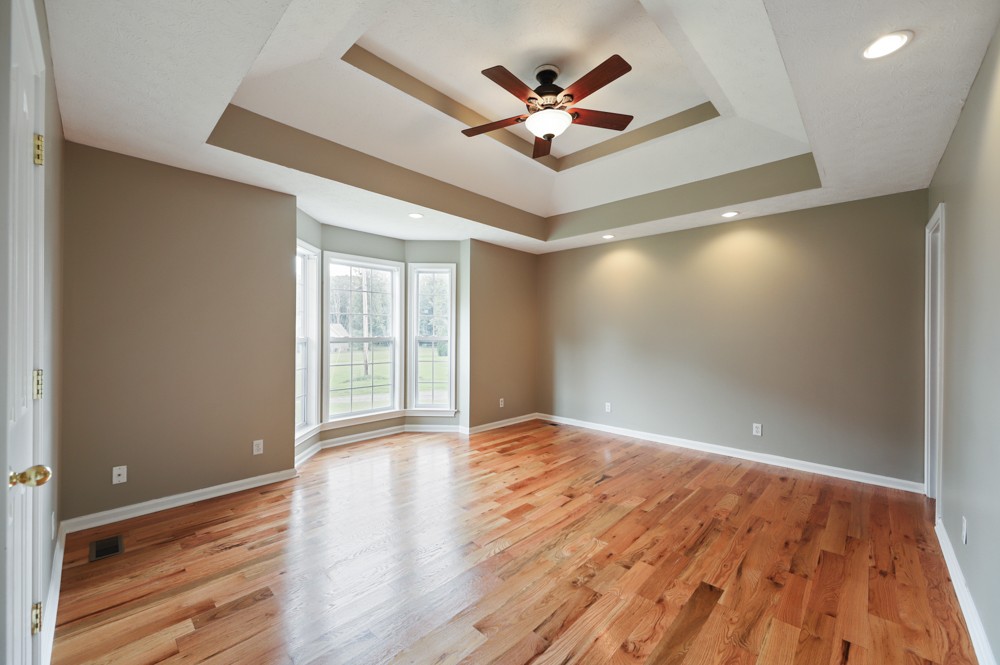 323 Independence Street Springfield, TN 37172 - Photo 17 of 37 a view of an empty room with wooden floor and a window