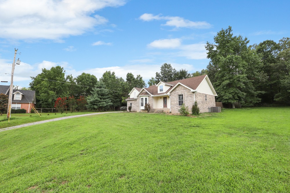 323 Independence Street Springfield, TN 37172 - Photo 5 of 37 a view of a big yard with a house