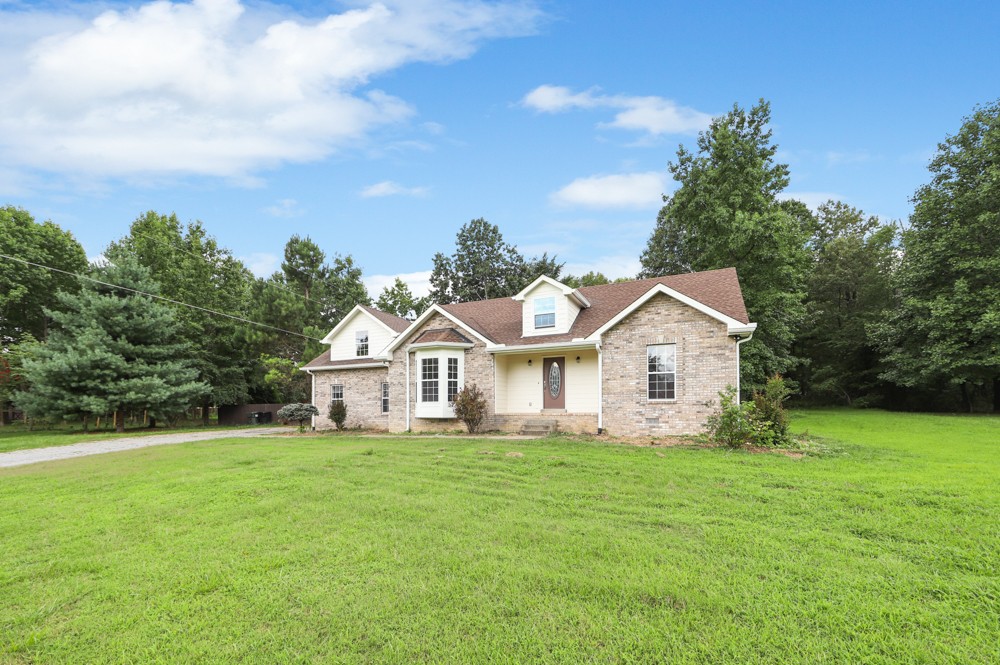 323 Independence Street Springfield, TN 37172 - Photo 6 of 37 a view of a house with a yard and potted plants
