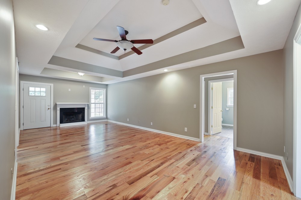 323 Independence Street Springfield, TN 37172 - Photo 10 of 37 a view of an empty room with window and wooden floor