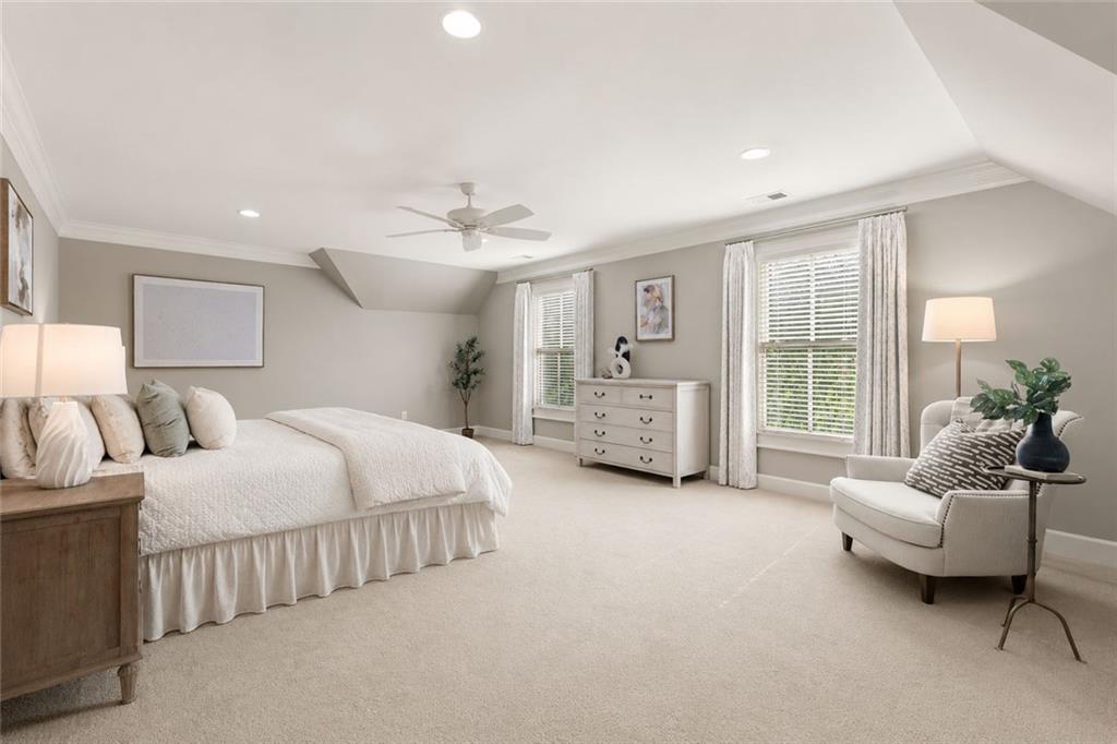 1450 Acworth Due West Road Northwest Kennesaw, GA 30152 - Photo 34 of 77 a spacious bedroom with a bed and a couch