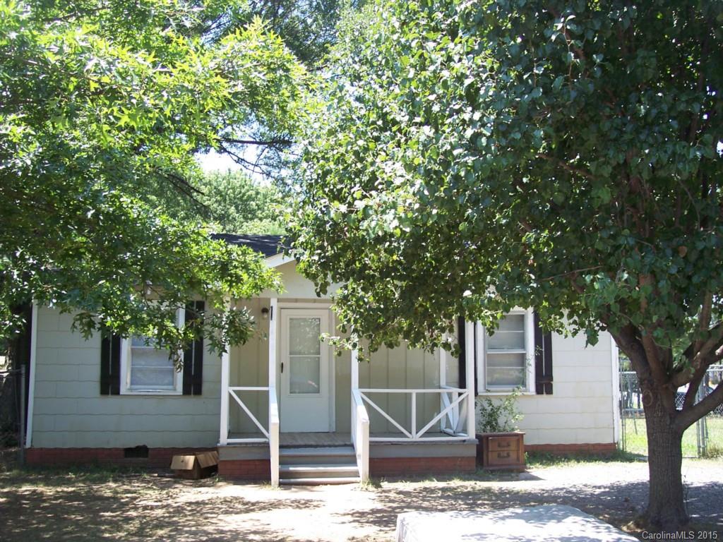 1405 Cherry Street Monroe, NC 28110 - Photo 1 of 1 a front view of a house with garden
