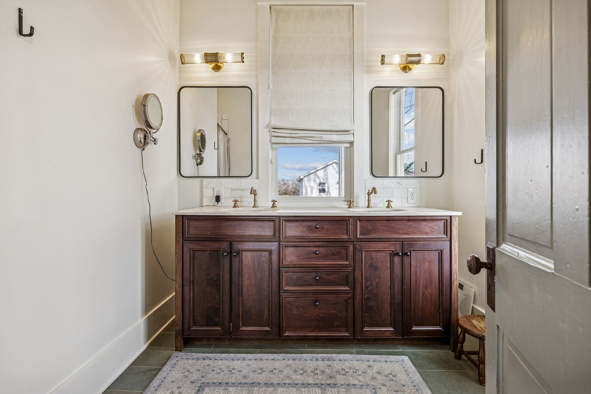 6320 Arno Road Franklin, TN 37064 - Photo 22 of 49 a bathroom with a sink and a mirror