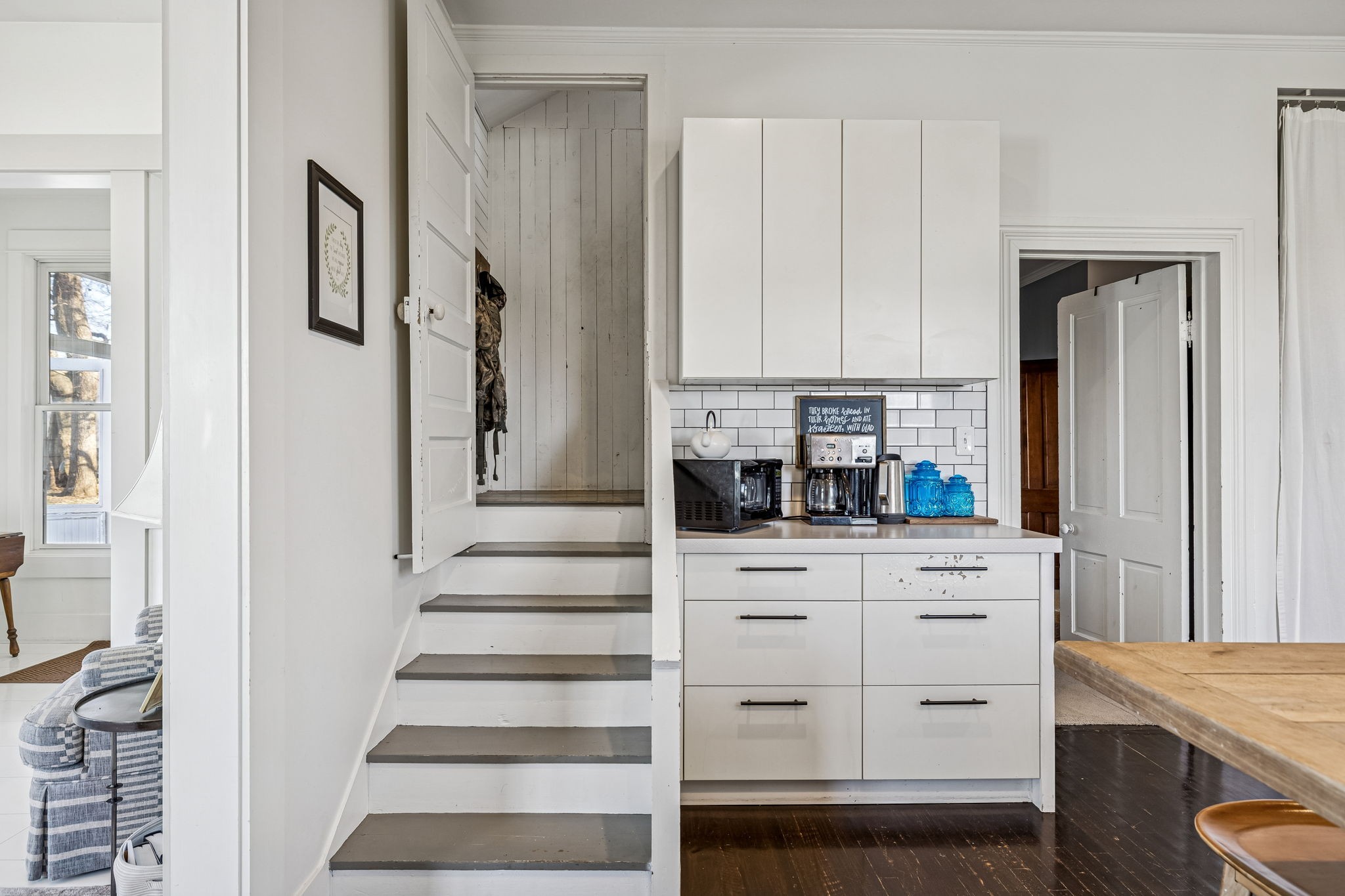 6320 Arno Road Franklin, TN 37064 - Photo 27 of 49 a kitchen with white cabinets and stainless steel appliances