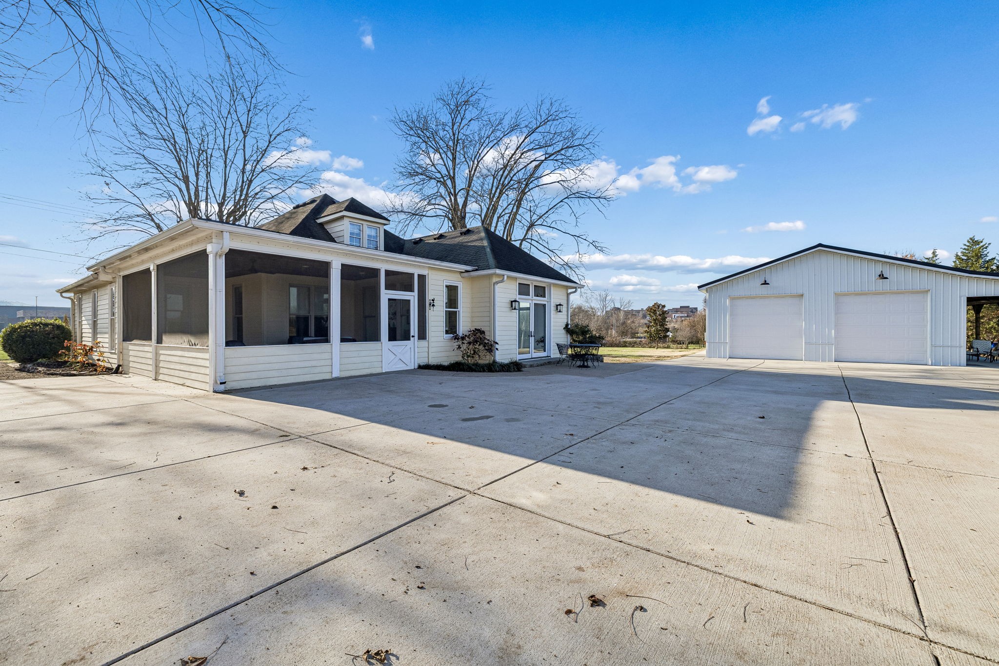 6320 Arno Road Franklin, TN 37064 - Photo 34 of 49 a front view of a house with a yard and garage