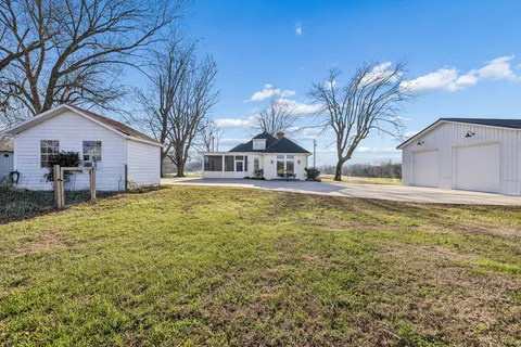 a house view with a swimming pool