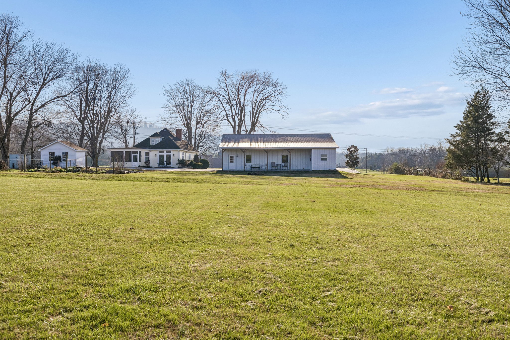 6320 Arno Road Franklin, TN 37064 - Photo 44 of 49 a view of a large pool with lawn chairs under an umbrella