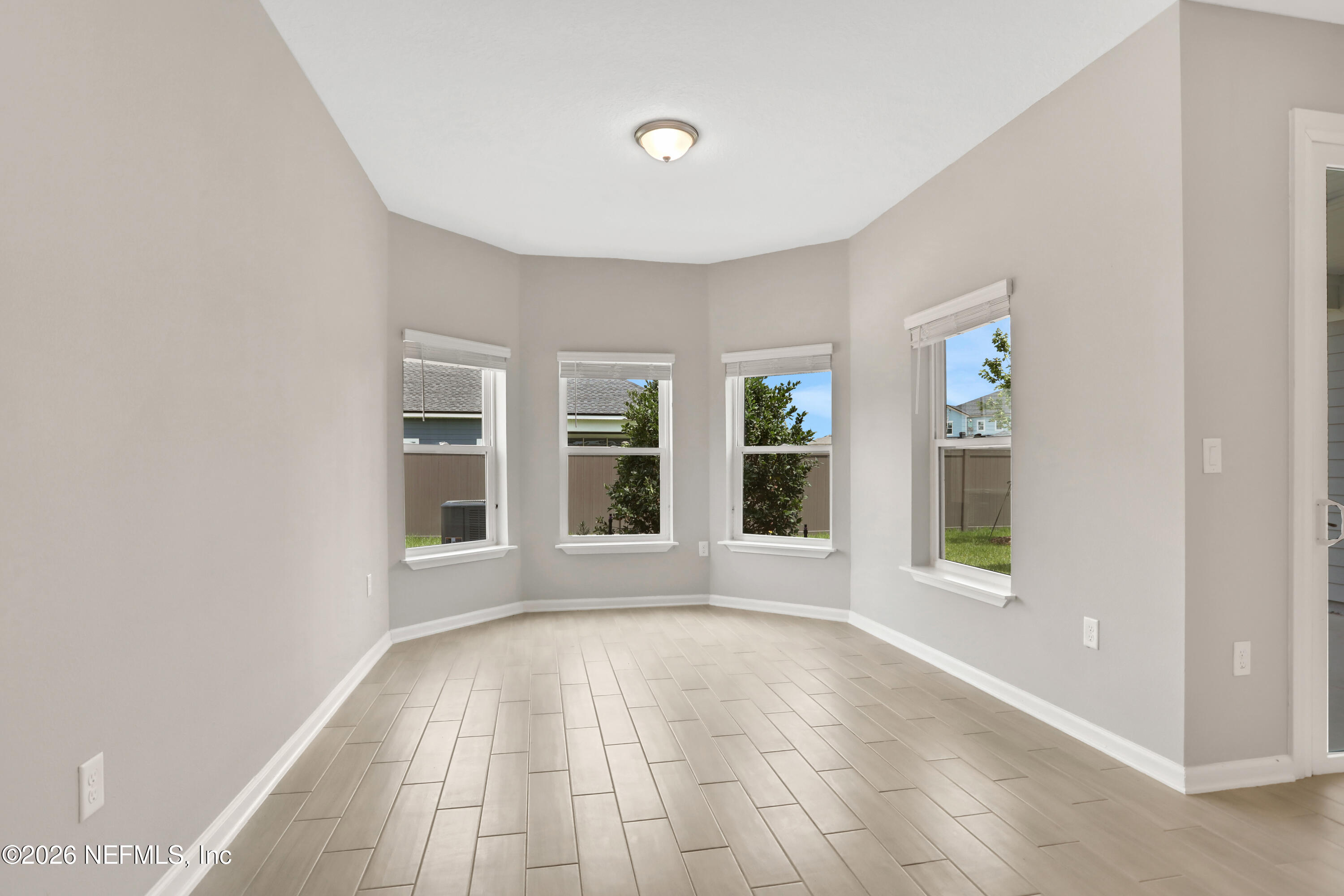 3157 Gadwall Road Orange Park, FL 32065 - Photo 12 of 36 a view of an empty room with a window